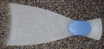 Tinting rake with teeth